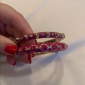 Two spring close pink and gold bangles